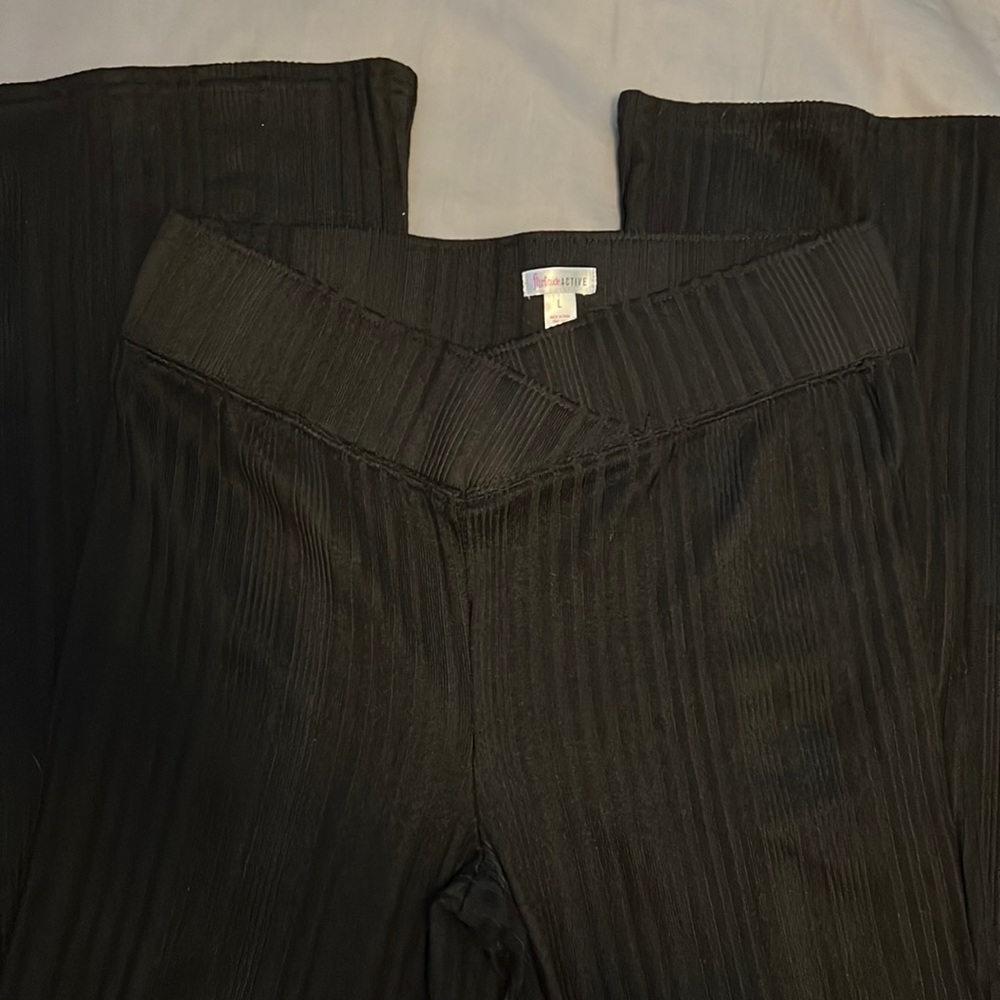 Flirtitude. Size Large. Active wear. Pants flared.